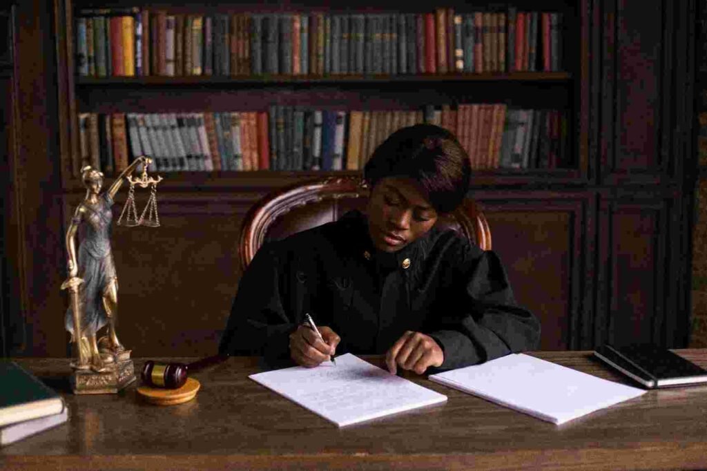 motorcycle accident attorney writing on a paper